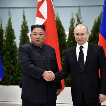 Vladimir Putin and Kim Jong Un