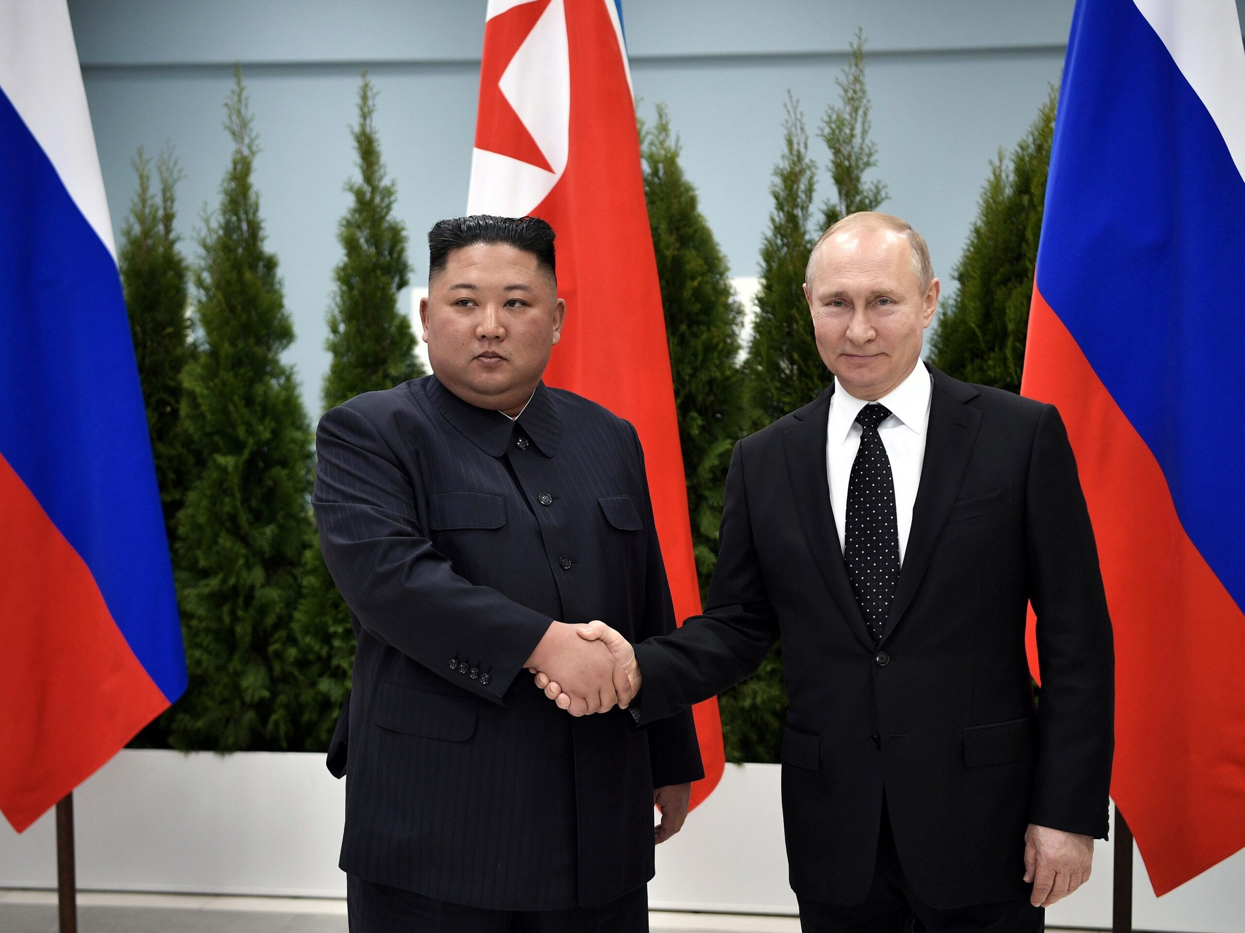 Vladimir Putin and Kim Jong Un